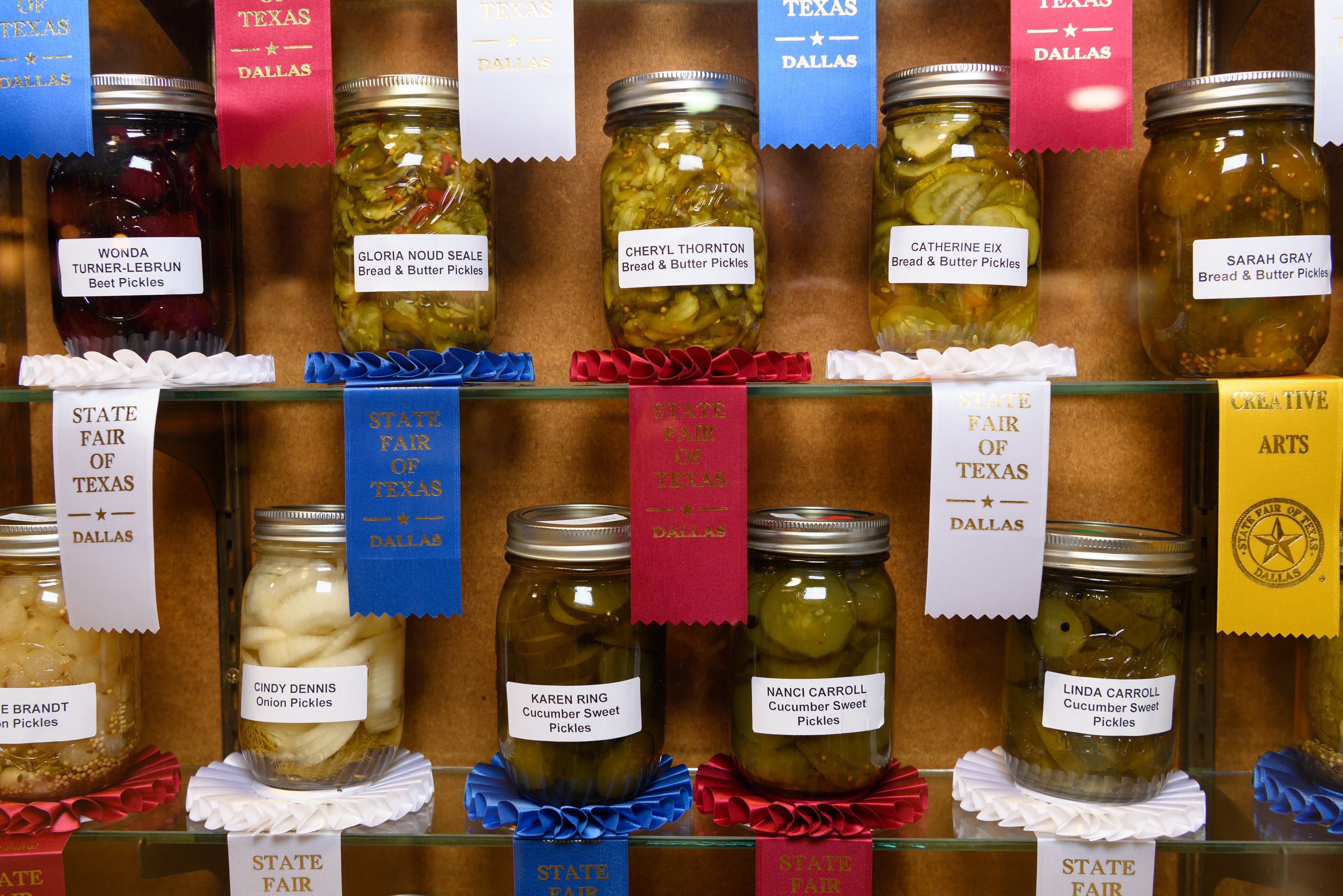 File photo: Preserved-food jars are displayed with State Fair award ribbons.