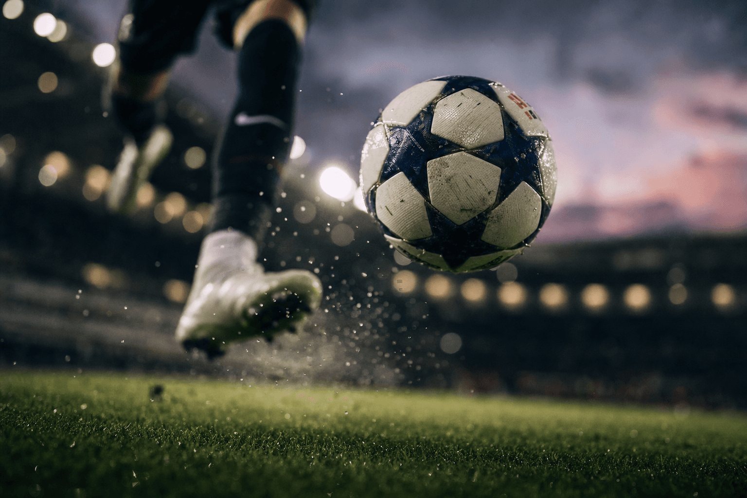 Close-up of a soccer ball being kicked in a floodlit stadium, illustrative editorial photo for 2026 FIFA World Cup coverage